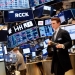 tom holland rings the opening bell at the new york stock exchange trading floor, 3 5 mm photography, highly detailed, cinematic lighting, 4 k